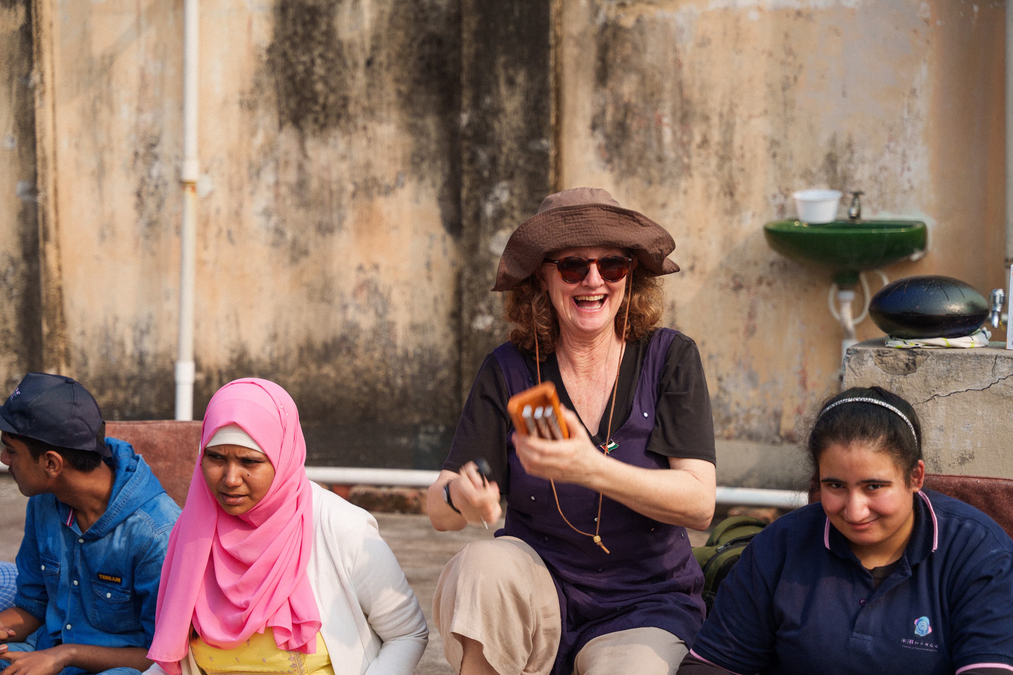 Kelly acting with Autistic people using the Hunter Heartbeat method in India